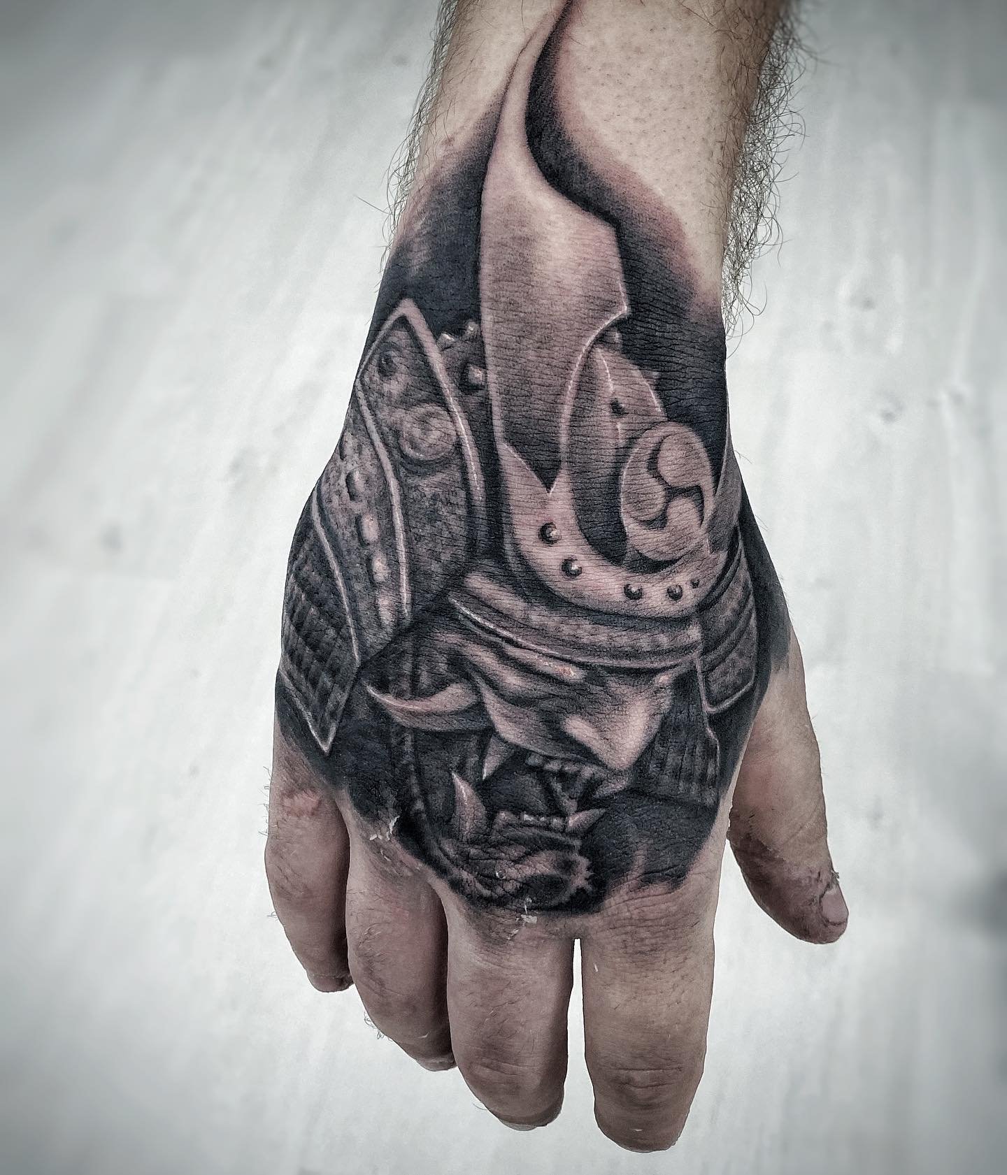 Custom geometric tattoo design on upper arm