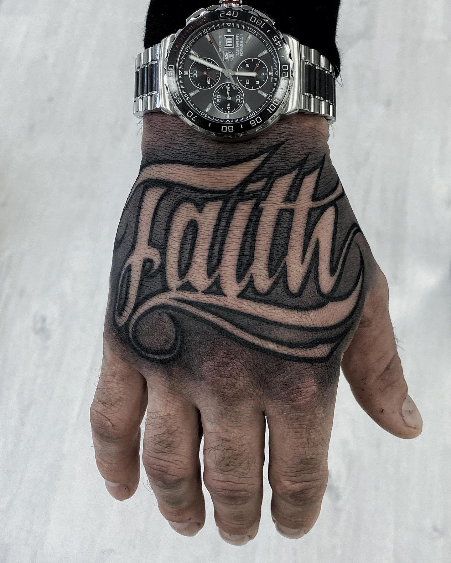 Custom geometric tattoo design on upper arm