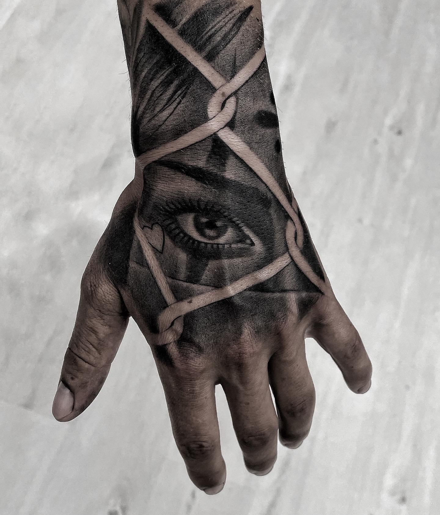 Custom geometric tattoo design on upper arm